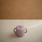 mushie Silicone Snack Cup | Spill Proof Food Container for Toddler and Baby (Soft Lilac)