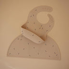 mushie Silicone Baby Bib | Adjustable Fit Waterproof Bibs (Bees)