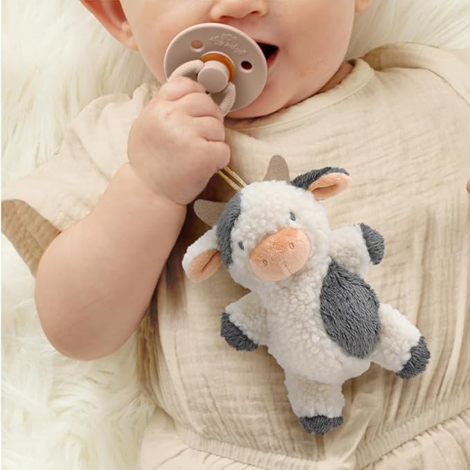 Itzy Ritzy Pacifier & Lovey Set - Natural Rubber Pacifier with Stuffed Animal Lovey - Detachable Plush Cow Binky Holder & Coordinating Natural Rubber Binky, Ideal for Ages 0-6 Months (Cow)