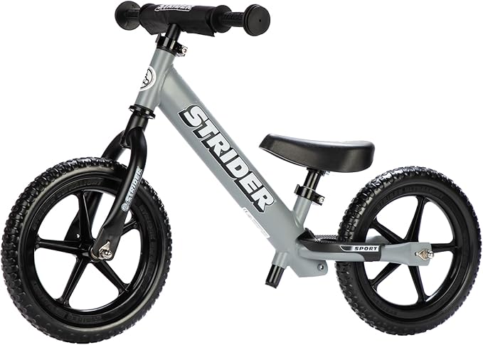Strider 12” Sport Bike - No Pedal Balance Bicycle for Kids 1 to 4 Years - Includes Safety Pad, Padded Seat, Mini Grips & Flat-Free Tires - Tool-Free Assembly & Adjustments