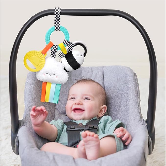 Itzy Ritzy Teething Activity Toy - Bitzy Busy Ring Infant Teething Toy Features Braided Ring & Dangling Toys, Includes Teether, Ribbons, Crinkle Sound & Jingle Bell - 0 Months & Up (High Contrast)