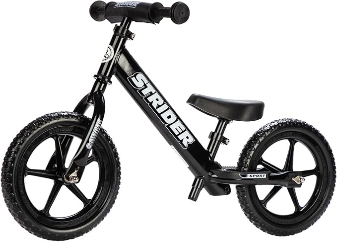 Strider 12” Sport Bike - No Pedal Balance Bicycle for Kids 1 to 4 Years - Includes Safety Pad, Padded Seat, Mini Grips & Flat-Free Tires - Tool-Free Assembly & Adjustments