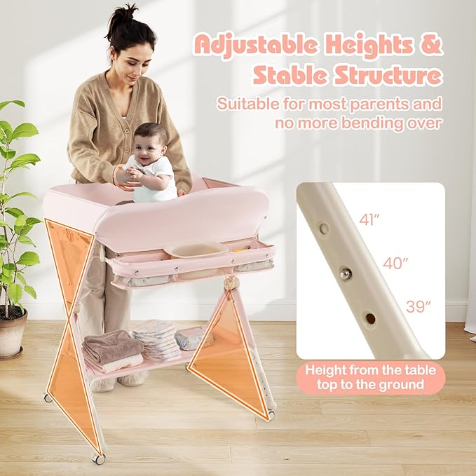 INFANS Baby Changing Table with Wheels, Portable Folding Diaper Station Nursery Organizer with Storage Basket, Hanging Rack, Adjustable Height, Safety Belt for Newborn Infant (Light Pink)