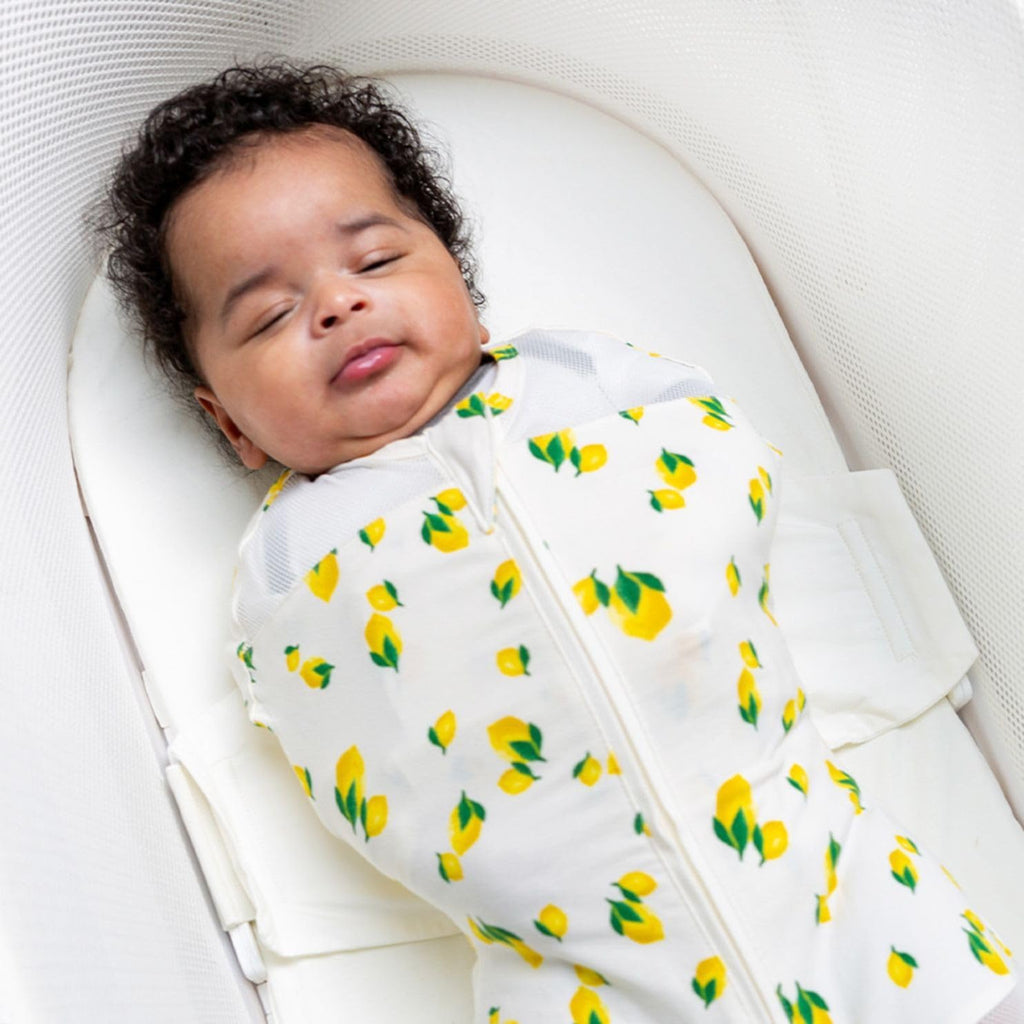 Happiest Baby SNOO Sleep Sack - 100% Organic Cotton Baby Swaddle Blanket - Doctor Designed Promotes Healthy Hip Development (Ivory Lemons, Large)
