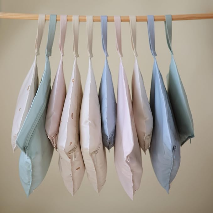 mushie Water Resistant Wet Bags | Large & Small Reusable Storage Bag for Baby Items and Travel | Zippered Pockets with Handle | Machine Washable, Set of 2 (Sun)