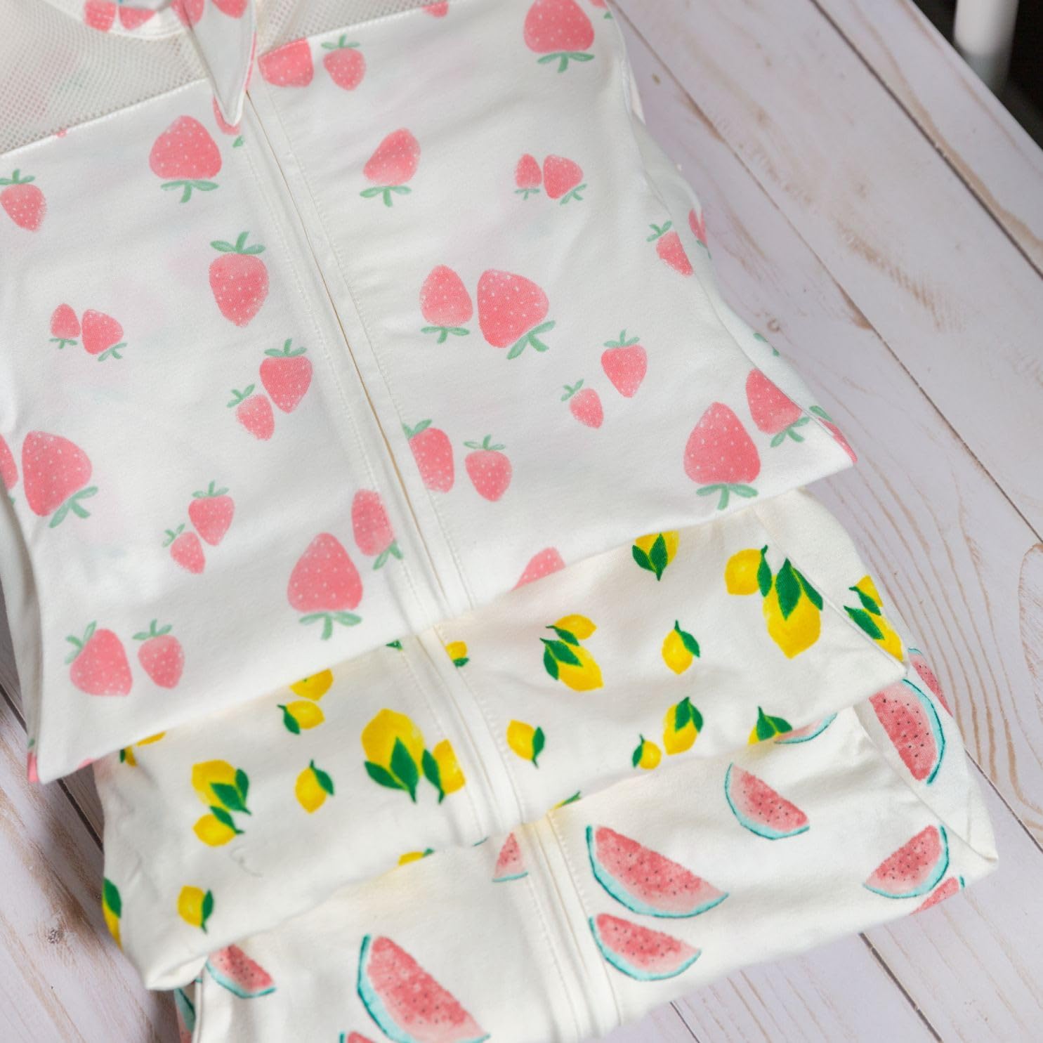 Happiest Baby SNOO Sleep Sack - 100% Organic Cotton Baby Swaddle Blanket - Doctor Designed Promotes Healthy Hip Development (Ivory Lemons, Large)