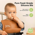 KeaBabies 2-Pack Silicone Baby Bibs for Eating - Sturdy Food-Grade Silicone Bibs for Babies Girl, Boy, Large Food Catcher, Clean & Put On Easily, Waterproof Toddler Feeding Essentials (Terracotta)