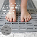 SlipX Solutions Weighted Non Slip Bath Mat for Textured Tub & Shower Surfaces | Patent Pending | Anti Slip Bathtub Safety Without Suction Cups | Doesn’t Float, Works on Tile & Stone 31” x 15”