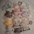 mushie Silicone Baby Bib | Adjustable Fit Waterproof Bibs (Dusty Rose)