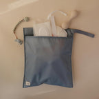 mushie Water Resistant Wet Bags | Large & Small Reusable Storage Bag for Baby Items and Travel | Zippered Pockets with Handle | Machine Washable, Set of 2 (Tradewinds)