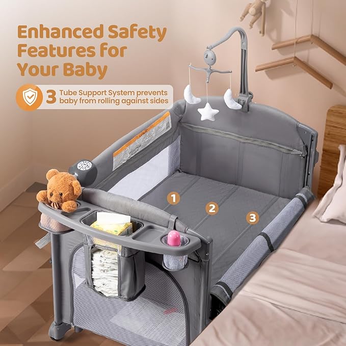 JOYMOR 9 in 1 Bedside Bassinet with Changing Table, Pack and Play with Bassinet, Convert to Rocking Baby Bed with Electric Music Center, Mosquito Net, Storage, Gray