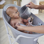 Shnuggle Newborn Baby Bath | Built in Support Bump and Soft Backrest | Suitable from Newborn | Bath Seat Support Includes Plug | Pebble Grey