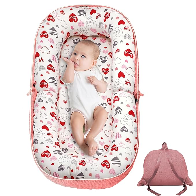 Baby Lounger, Foldable Infant Nest Pillow with Soft Memory Foam Mat, Cover with Adorable Pattern, Converts to Backpack for Easy Travel, 0-12 Months, Pink