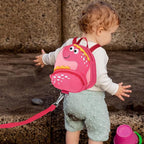 Accmor Toddler Backpack Harness with Safety Leash, Cute Dinosaur Harnesses with Kids Anti Lost Wrist Link, Mini Child Schoolbag with Wristband Tether Strap and Protection Leashes for Baby Girls (Pink)