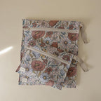 mushie Water Resistant Wet Bags | Large & Small Reusable Storage Bag for Baby Items and Travel | Zippered Pockets with Handle | Machine Washable, Set of 2 (Retro Flowers)
