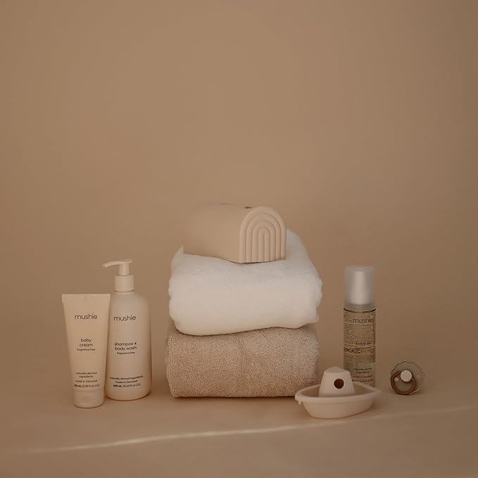 mushie Bath Spout Cover | Soft Silicone Bathtub Faucet Safety Guard for Kids | Universal Fit (Shifting Sand)