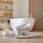 Shnuggle Newborn Baby Bath | Built in Support Bump and Soft Backrest | Suitable from Newborn | Bath Seat Support Includes Plug | Taupe