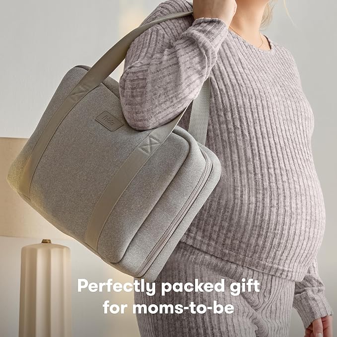 Frida Mom 30pc Pre-Packed Hosptial & Baby Essentials Travel Bag, Includes C-Section Delivery & Recovery Must Haves, & Newborn Grooming Kit, Easy to Organize, Removable Toiletry Bags & Suitcase Strap