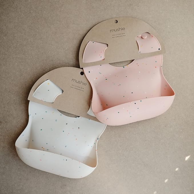 mushie Silicone Baby Bib | Adjustable Fit Waterproof Bibs (Vanilla Confetti)