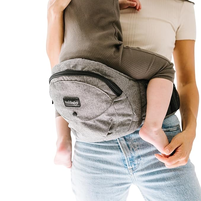 Tushbaby The Original Premium Quality Hip Seat Carrier – Safety-Certified Baby & Toddler Carrier with Secure Safety Buckles, No-Flimsy-Foam Design, Storage Pockets & Nursing Pillow. 0–3 yrs