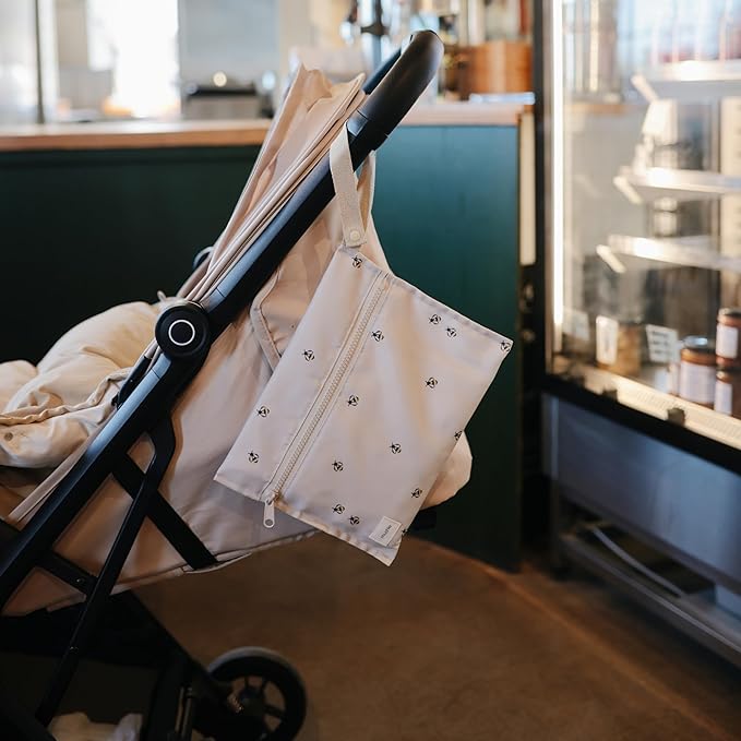 mushie Water Resistant Wet Bags | Large & Small Reusable Storage Bag for Baby Items and Travel | Zippered Pockets with Handle | Machine Washable, Set of 2 (Bees)