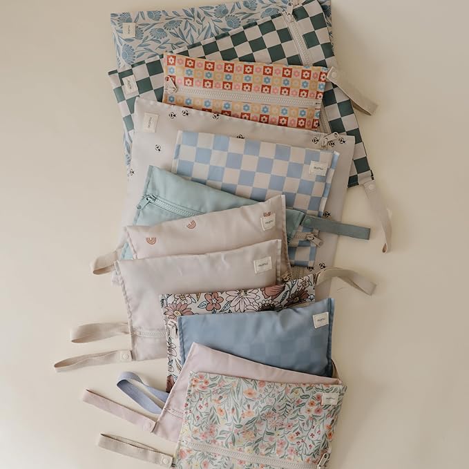 mushie Water Resistant Wet Bags | Large & Small Reusable Storage Bag for Baby Items and Travel | Zippered Pockets with Handle | Machine Washable, Set of 2 (Happy Flowers Check)