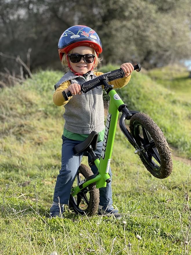Strider 12” Sport Bike - No Pedal Balance Bicycle for Kids 1 to 4 Years - Includes Safety Pad, Padded Seat, Mini Grips & Flat-Free Tires - Tool-Free Assembly & Adjustments