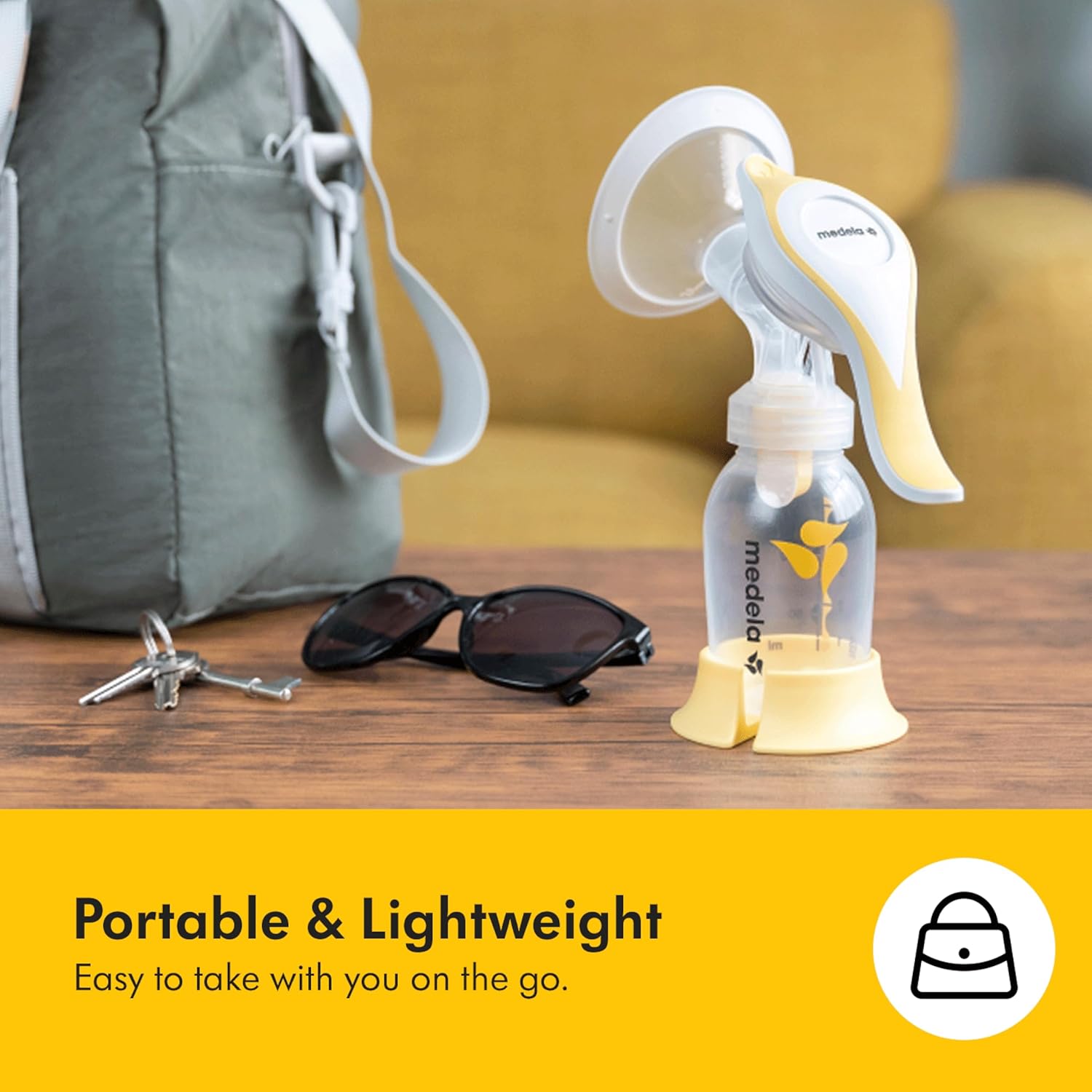 Medela Harmony Manual Breast Pump, Compact Swiss Design with PersonalFit Flex Shields and Medela's 2-Phase Expression Technology