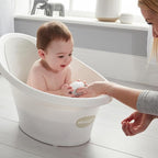 Shnuggle Newborn Baby Bath | Built in Support Bump and Soft Backrest | Suitable from Newborn | Bath Seat Support Includes Plug | White with Grey Backrest