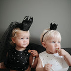 mushie Silicone Baby Bib | Adjustable Fit Waterproof Bibs (Letters White)