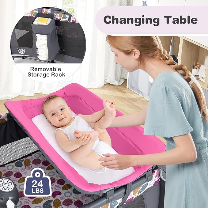 BABY JOY 5 in 1 Pink Pack and Play, Portable Baby Playard with Bassinet & Changing Table, Infant Pink Bassinet Nursery Center w/Toys & Music & Oxford Bag for Baby Girl Toddlers (Rose, Dot Circle)