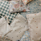 mushie Water Resistant Wet Bags | Large & Small Reusable Storage Bag for Baby Items and Travel | Zippered Pockets with Handle | Machine Washable, Set of 2 (Happy Flowers Check)