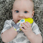 bblüv - Glüv - Original Silicone Baby Teething Mitten with Opposable Thumb, Self Soothing Teether Toy, Includes a Storage Bag (Lime)