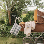 mushie Water Resistant Wet Bags | Large & Small Reusable Storage Bag for Baby Items and Travel | Zippered Pockets with Handle | Machine Washable, Set of 2 (Pastel Blooms)