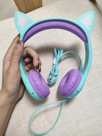 Olyre Kids Headphones with MIC for School, 85dB Safe Volume Limited Light Up Cat Ear Headphones,Wired Cord On-Ear Headset for Children/Boys/Girls/Travel-Green/Purple
