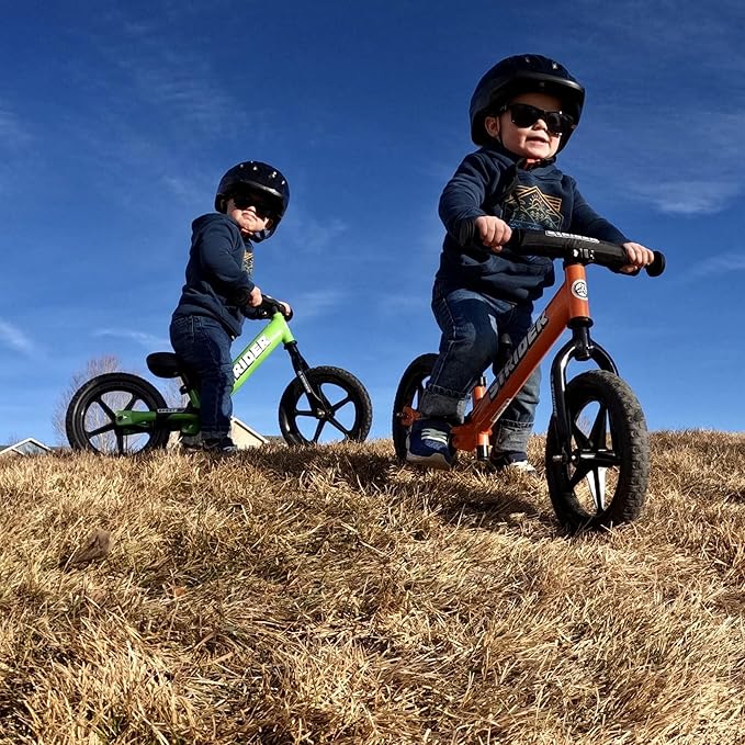 Strider 12” Sport Bike - No Pedal Balance Bicycle for Kids 1 to 4 Years - Includes Safety Pad, Padded Seat, Mini Grips & Flat-Free Tires - Tool-Free Assembly & Adjustments