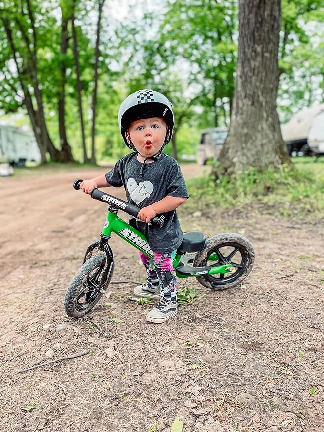 Strider 12” Sport Bike - No Pedal Balance Bicycle for Kids 1 to 4 Years - Includes Safety Pad, Padded Seat, Mini Grips & Flat-Free Tires - Tool-Free Assembly & Adjustments